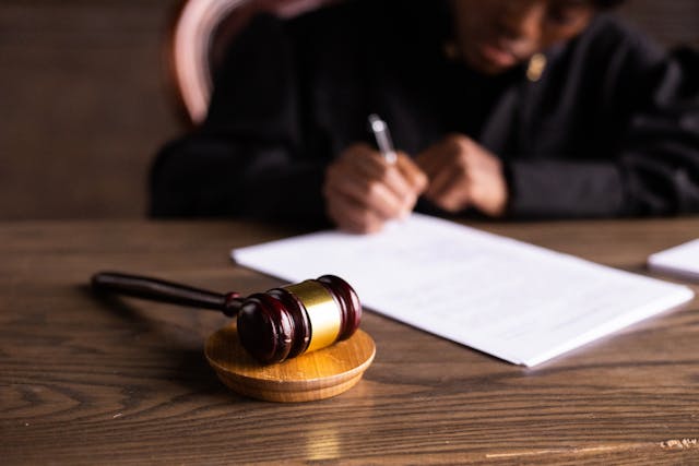 judge signing papers.jpg